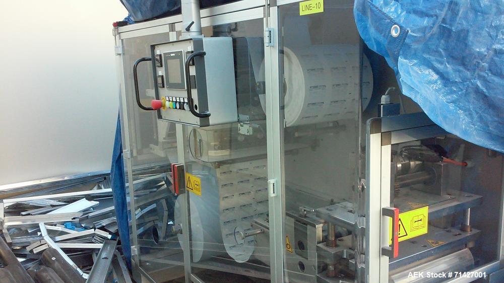 Used - Easysnap Packaging Machine, Model BB3. Monodose sachet machine can handle liquid or semi-dense products. Speed up to 120 Easysnap per minute. Max consumption 12 Kw/H. Air consumption 250/400 N...