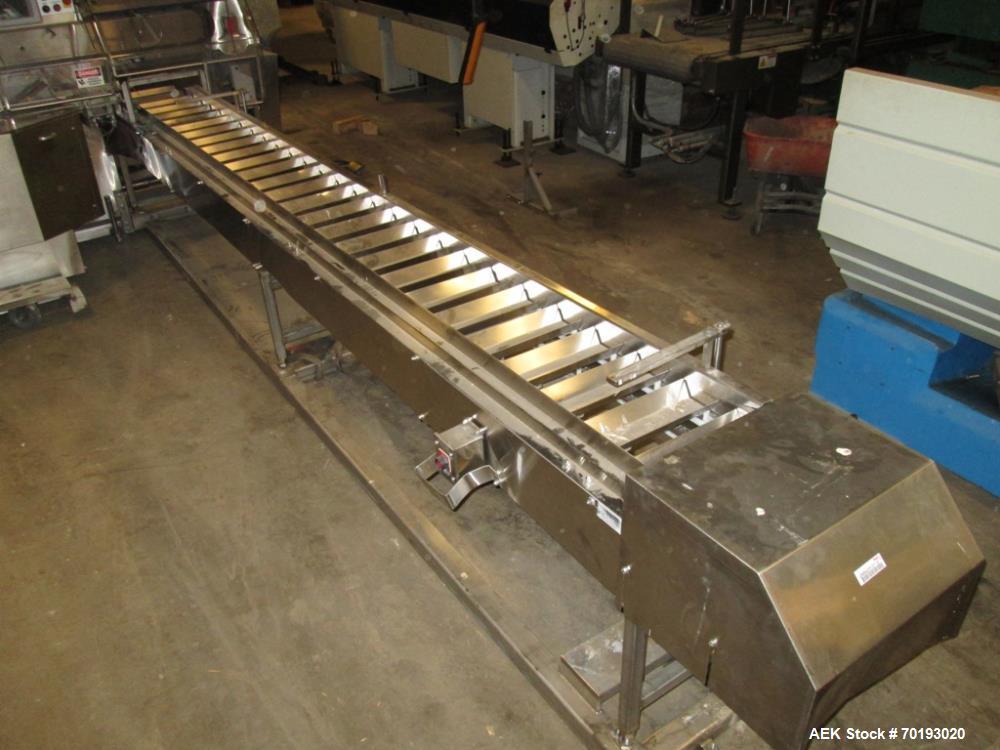 Used Formost GTS-4 Stainless Steel Bagger, Model GTS-4 LH. 86” Frame. Stainless steel construction. Rotary bag feed. 15’ front infeed bucket conveyor. 10’ rear discharge conveyor. Allen Bradley contr...