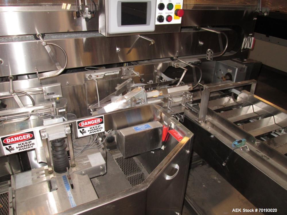 Used Formost GTS-4 Stainless Steel Bagger, Model GTS-4 LH. 86” Frame. Stainless steel construction. Rotary bag feed. 15’ front infeed bucket conveyor. 10’ rear discharge conveyor. Allen Bradley contr...