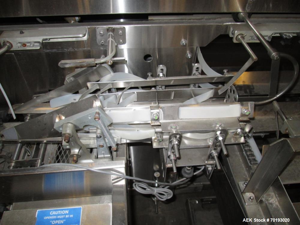 Used Formost GTS-4 Stainless Steel Bagger, Model GTS-4 LH. 86” Frame. Stainless steel construction. Rotary bag feed. 15’ front infeed bucket conveyor. 10’ rear discharge conveyor. Allen Bradley contr...
