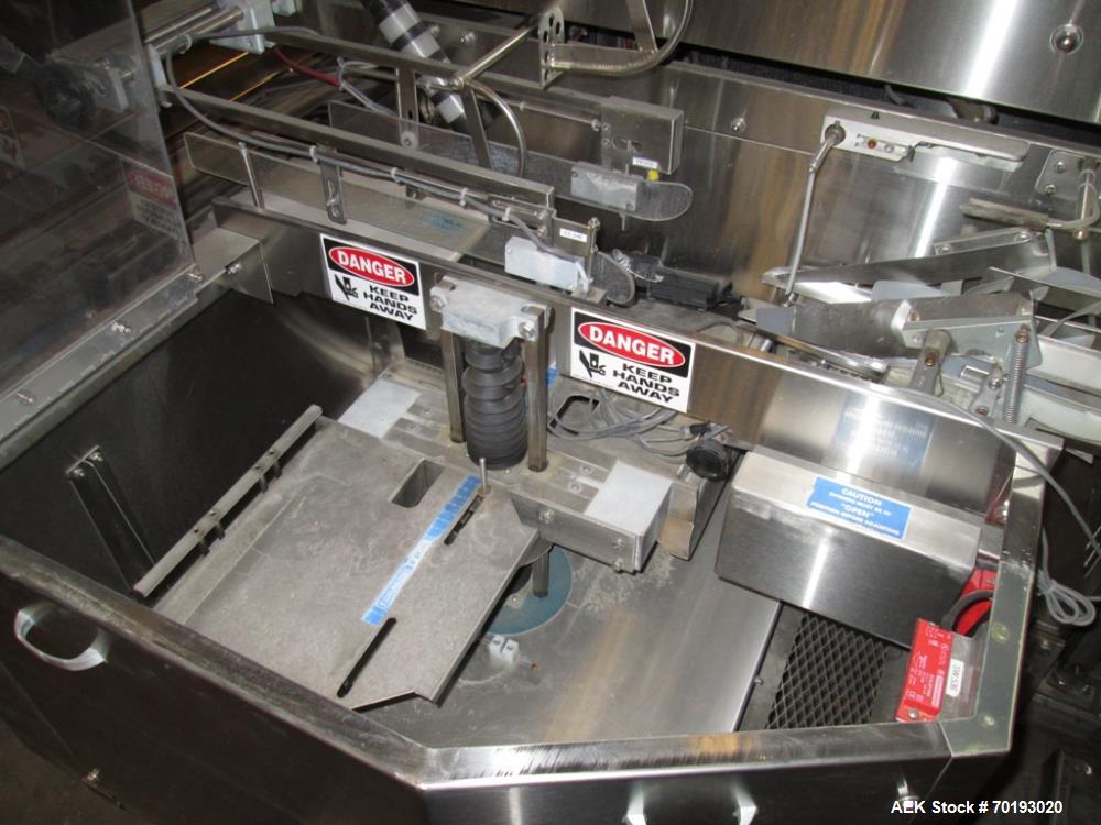Used Formost GTS-4 Stainless Steel Bagger, Model GTS-4 LH. 86” Frame. Stainless steel construction. Rotary bag feed. 15’ front infeed bucket conveyor. 10’ rear discharge conveyor. Allen Bradley contr...