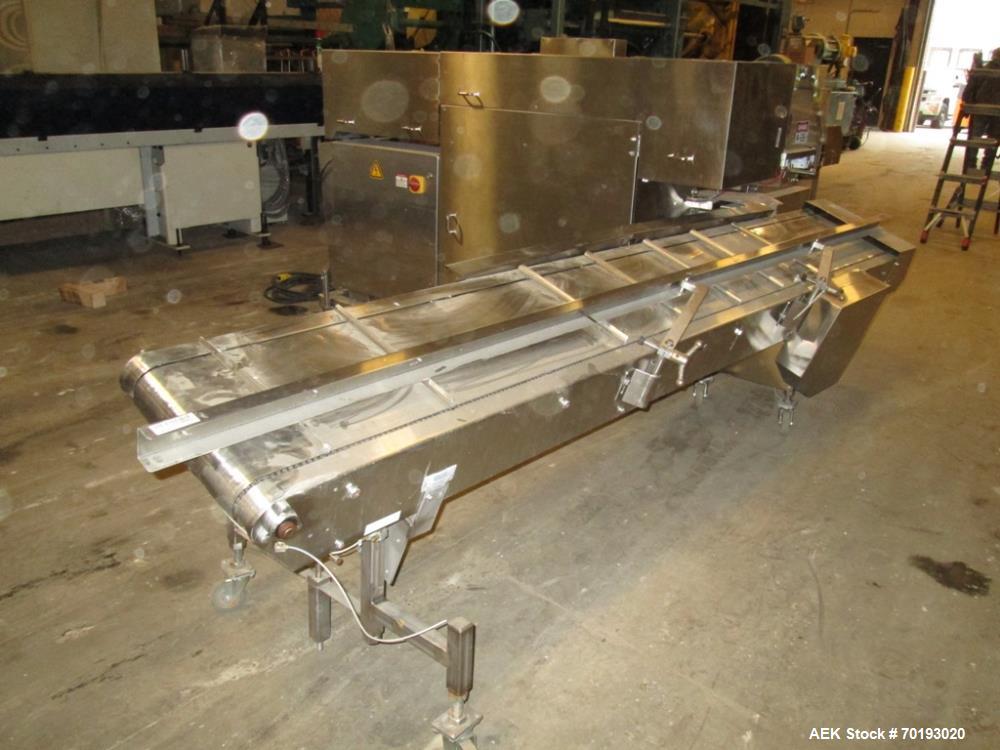 Used Formost GTS-4 Stainless Steel Bagger, Model GTS-4 LH. 86” Frame. Stainless steel construction. Rotary bag feed. 15’ front infeed bucket conveyor. 10’ rear discharge conveyor. Allen Bradley contr...