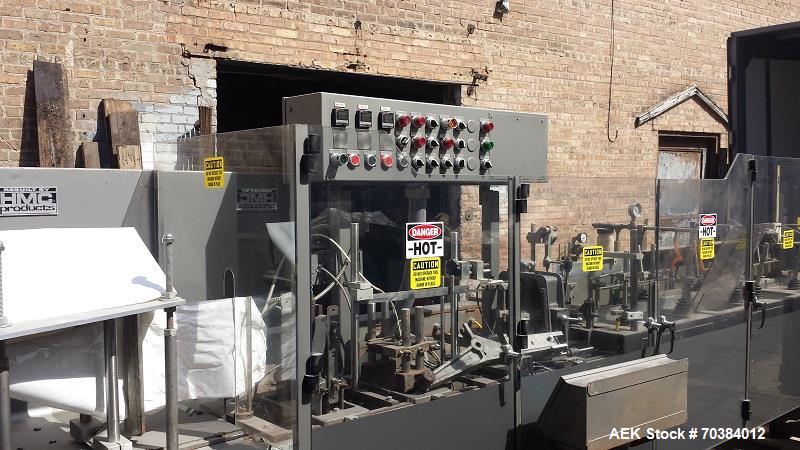 Used HMC/Bartelt IM10-10 Poucher, Model - IM 10-10. Bartelt horizontal style poucher. Right hand machine with four point plow, dual rockers and standard film feed rollers . 10" centers with single mo...