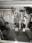 Used Bossar Form & Fill Horizontal Pouch Filler, Model B 1400 D. Capable of speeds up to 110. Size range 50mm to 140mm wide x 50mm to 210mm height. Maximum fill volume 400cc. Setup for 4 sided seal p...