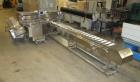 Used Formost GTS-4 Stainless Steel Bagger, Model GTS-4 LH. 86” Frame. Stainless steel construction. Rotary bag feed. 15’ front infeed bucket conveyor. 10’ rear discharge conveyor. Allen Bradley contr...