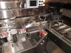 Used Formost GTS-4 Stainless Steel Bagger, Model GTS-4 LH. 86” Frame. Stainless steel construction. Rotary bag feed. 15’ front infeed bucket conveyor. 10’ rear discharge conveyor. Allen Bradley contr...