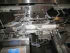 Used Formost GTS-4 Stainless Steel Bagger, Model GTS-4 LH. 86” Frame. Stainless steel construction. Rotary bag feed. 15’ front infeed bucket conveyor. 10’ rear discharge conveyor. Allen Bradley contr...