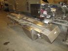 Used Formost GTS-4 Stainless Steel Bagger, Model GTS-4 LH. 86” Frame. Stainless steel construction. Rotary bag feed. 15’ front infeed bucket conveyor. 10’ rear discharge conveyor. Allen Bradley contr...
