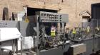 Used HMC/Bartelt IM10-10 Poucher, Model - IM 10-10. Bartelt horizontal style poucher. Right hand machine with four point plow, dual rockers and standard film feed rollers . 10
