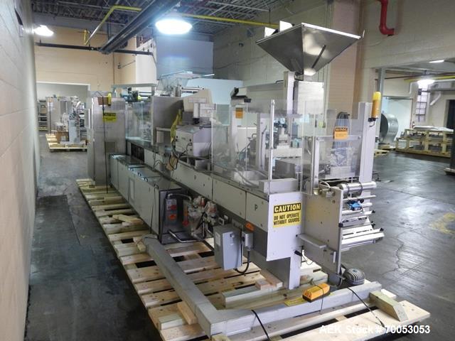 Used One (1) used Uhlmann thermoforming blister packaging machine, model UPS3, with Aylward feeder, Neslab chiller, full controls, reject station, serial# 189, built 1988.