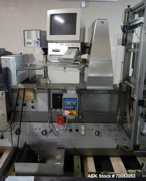 Used One (1) used Uhlmann thermoforming blister packaging machine, model UPS3, with Aylward feeder, Neslab chiller, full controls, reject station, serial# 189, built 1988.