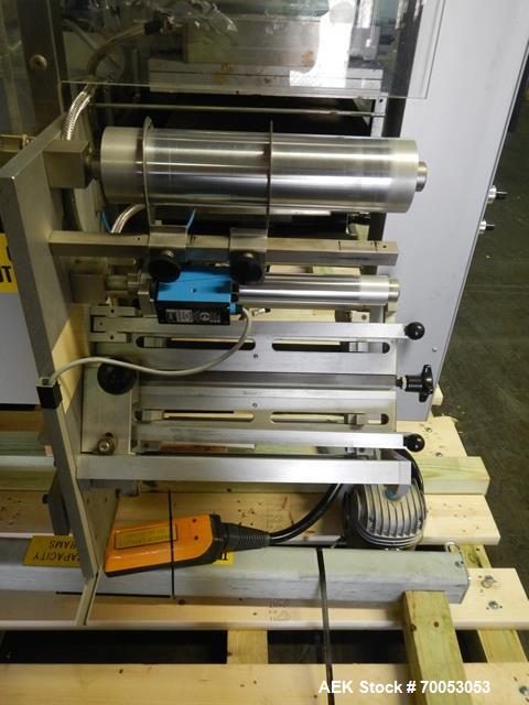 Used One (1) used Uhlmann thermoforming blister packaging machine, model UPS3, with Aylward feeder, Neslab chiller, full controls, reject station, serial# 189, built 1988.