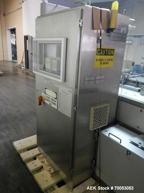 Used One (1) used Uhlmann thermoforming blister packaging machine, model UPS3, with Aylward feeder, Neslab chiller, full controls, reject station, serial# 189, built 1988.