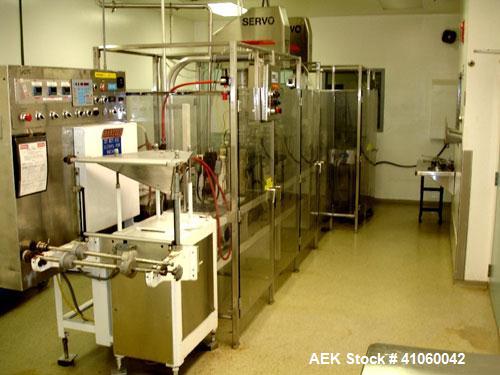 Used Bartelt Horizontal Form Fill Seal 
Machine, Model IM-9-14, 15' long table, with (2) All Fill Cerebus servo filling heads, model SV-300 and model IM100-CT-CM high speed checkweigher, with control...