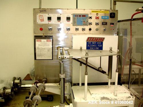Used Bartelt Horizontal Form Fill Seal 
Machine, Model IM-9-14, 15' long table, with (2) All Fill Cerebus servo filling heads, model SV-300 and model IM100-CT-CM high speed checkweigher, with control...