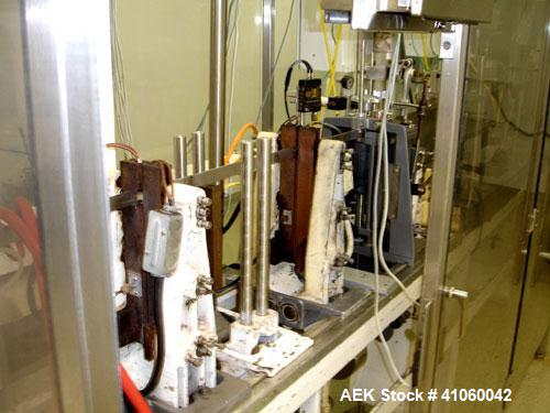 Used Bartelt Horizontal Form Fill Seal 
Machine, Model IM-9-14, 15' long table, with (2) All Fill Cerebus servo filling heads, model SV-300 and model IM100-CT-CM high speed checkweigher, with control...