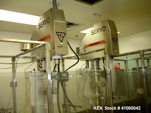 Used Bartelt Horizontal Form Fill Seal 
Machine, Model IM-9-14, 15' long table, with (2) All Fill Cerebus servo filling heads, model SV-300 and model IM100-CT-CM high speed checkweigher, with control...