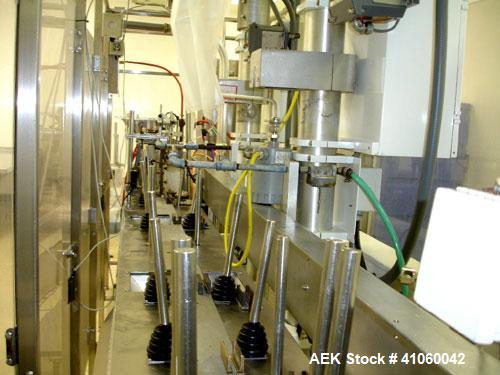 Used Bartelt Horizontal Form Fill Seal 
Machine, Model IM-9-14, 15' long table, with (2) All Fill Cerebus servo filling heads, model SV-300 and model IM100-CT-CM high speed checkweigher, with control...