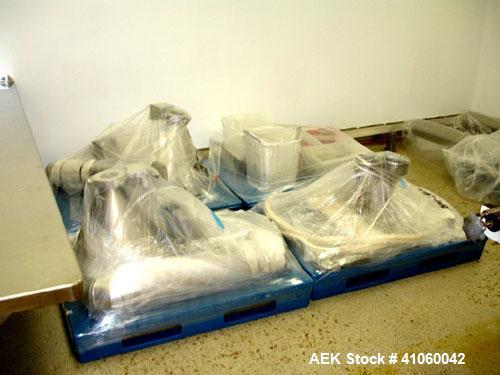 Used Bartelt Horizontal Form Fill Seal 
Machine, Model IM-9-14, 15' long table, with (2) All Fill Cerebus servo filling heads, model SV-300 and model IM100-CT-CM high speed checkweigher, with control...