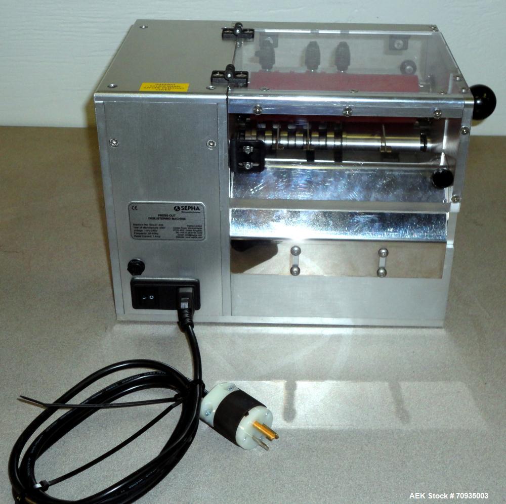 Used Sepha Model T406-001 Press Out Semi-Automatic Deblistering Machine. Can deblister reject packs at a rate of up to 40 blisters per minute. Maximum pack size 170mm Wide X unlimited length. Stainle...