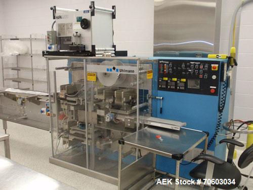 Used Uhlmann Thermoforming Blister Packaging Machine, Model UPS300. Currently running a 150mm x 120mm card, with Hapamatic foil printer, Neslab process chiller, 480 volt, serial# 552.