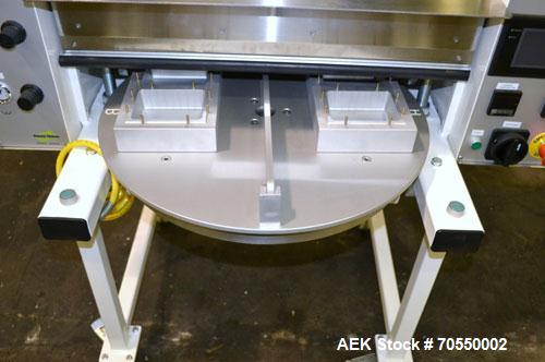 Used Tommy Nielsen Universal Model 301 FSX Rotary Blister Sealer. Machine is capable of speeds up to 700 blisters per hour. This machine forms the blister, operator manually loads the product.Built 2...
