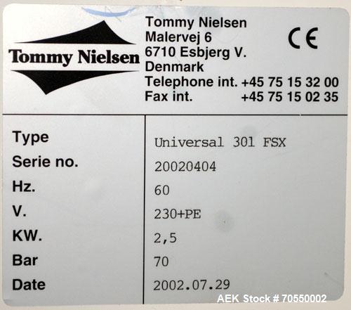 Used Tommy Nielsen Universal Model 301 FSX Rotary Blister Sealer. Machine is capable of speeds up to 700 blisters per hour. This machine forms the blister, operator manually loads the product.Built 2...