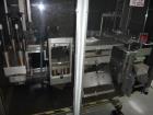 Used-Used Uhlmann thermoforming blister packaging machine, model UPS 4, Unit includes roll feed assembly, Neslab Chiller, fo...