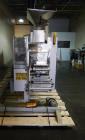 Used One (1) used Uhlmann thermoforming blister packaging machine, model UPS3, with Aylward feeder, Neslab chiller, full controls, reject station, serial# 189, built 1988.