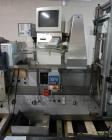 Used One (1) used Uhlmann thermoforming blister packaging machine, model UPS3, with Aylward feeder, Neslab chiller, full controls, reject station, serial# 189, built 1988.