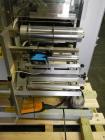 Used One (1) used Uhlmann thermoforming blister packaging machine, model UPS3, with Aylward feeder, Neslab chiller, full controls, reject station, serial# 189, built 1988.
