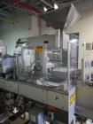 Used One (1) used Uhlmann thermoforming blister packaging machine, model UPS3, with Aylward feeder, Neslab chiller, full controls, reject station, serial# 189, built 1988.
