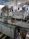 Used One (1) used Uhlmann thermoforming blister packaging machine, model UPS3, with Aylward feeder, Neslab chiller, full controls, reject station, serial# 189, built 1988.