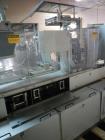 Used One (1) used Uhlmann thermoforming blister packaging machine, model UPS3, with Aylward feeder, Neslab chiller, full controls, reject station, serial# 189, built 1988.