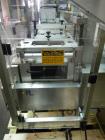 Used One (1) used Uhlmann thermoforming blister packaging machine, model UPS3, with Aylward feeder, Neslab chiller, full controls, reject station, serial# 189, built 1988.