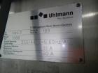 Used One (1) used Uhlmann thermoforming blister packaging machine, model UPS3, with Aylward feeder, Neslab chiller, full controls, reject station, serial# 189, built 1988.
