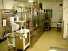Used Bartelt Horizontal Form Fill Seal 
Machine, Model IM-9-14, 15' long table, with (2) All Fill Cerebus servo filling heads, model SV-300 and model IM100-CT-CM high speed checkweigher, with control...