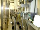 Used Bartelt Horizontal Form Fill Seal 
Machine, Model IM-9-14, 15' long table, with (2) All Fill Cerebus servo filling heads, model SV-300 and model IM100-CT-CM high speed checkweigher, with control...