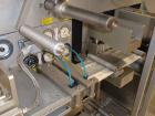 Used Uhlmann Thermoforming Blister Packaging Machine, Model UPS300. Currently running a 150mm x 120mm card, with Hapamatic foil printer, Neslab process chiller, 480 volt, serial# 552.