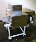 Used Tommy Nielsen Universal Model 301 FSX Rotary Blister Sealer. Machine is capable of speeds up to 700 blisters per hour. This machine forms the blister, operator manually loads the product.Built 2...