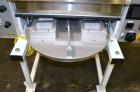 Used Tommy Nielsen Universal Model 301 FSX Rotary Blister Sealer. Machine is capable of speeds up to 700 blisters per hour. This machine forms the blister, operator manually loads the product.Built 2...