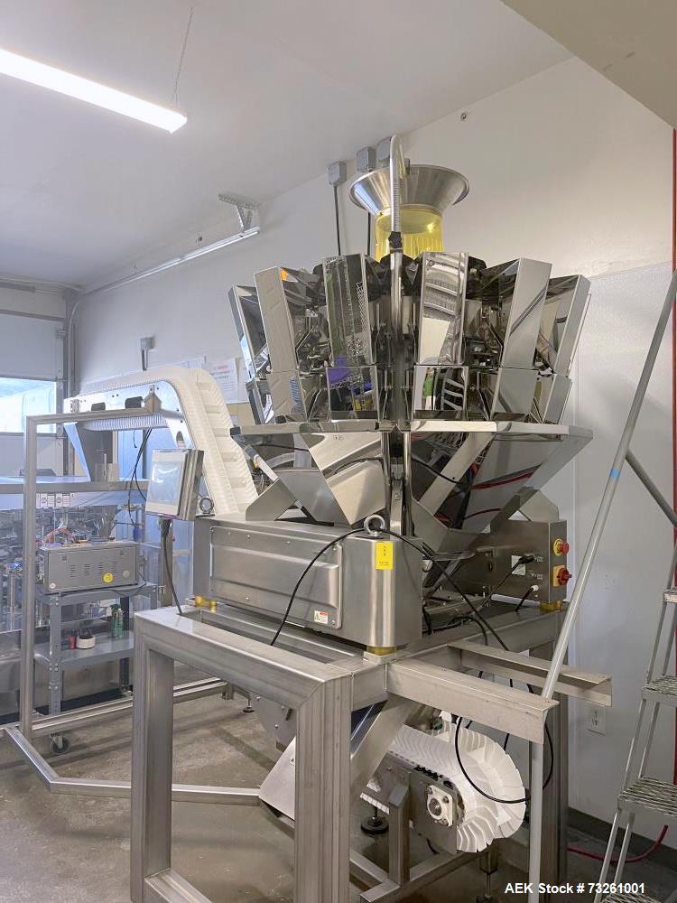 Used ActionPac APR360 Z/8 Rotary Pouch Packaging Machine with Scale & Elevator