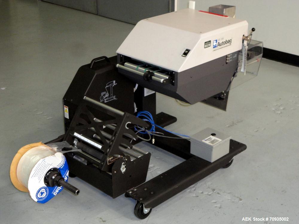 Used Automated Packaging Systems Autobag Model AB 180 Bagger. Capable of up to 80 bags per minute. Has bag size range of 2" to 11" Wide X 3" to 22" Long,  bag thickness of 1.0 to 4.0 mil, and Pass-th...
