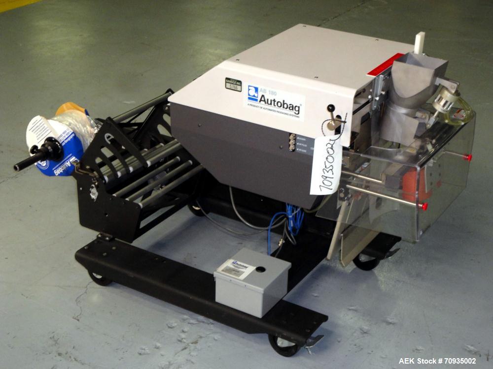 Used Automated Packaging Systems Autobag Model AB 180 Bagger. Capable of up to 80 bags per minute. Has bag size range of 2" to 11" Wide X 3" to 22" Long,  bag thickness of 1.0 to 4.0 mil, and Pass-th...