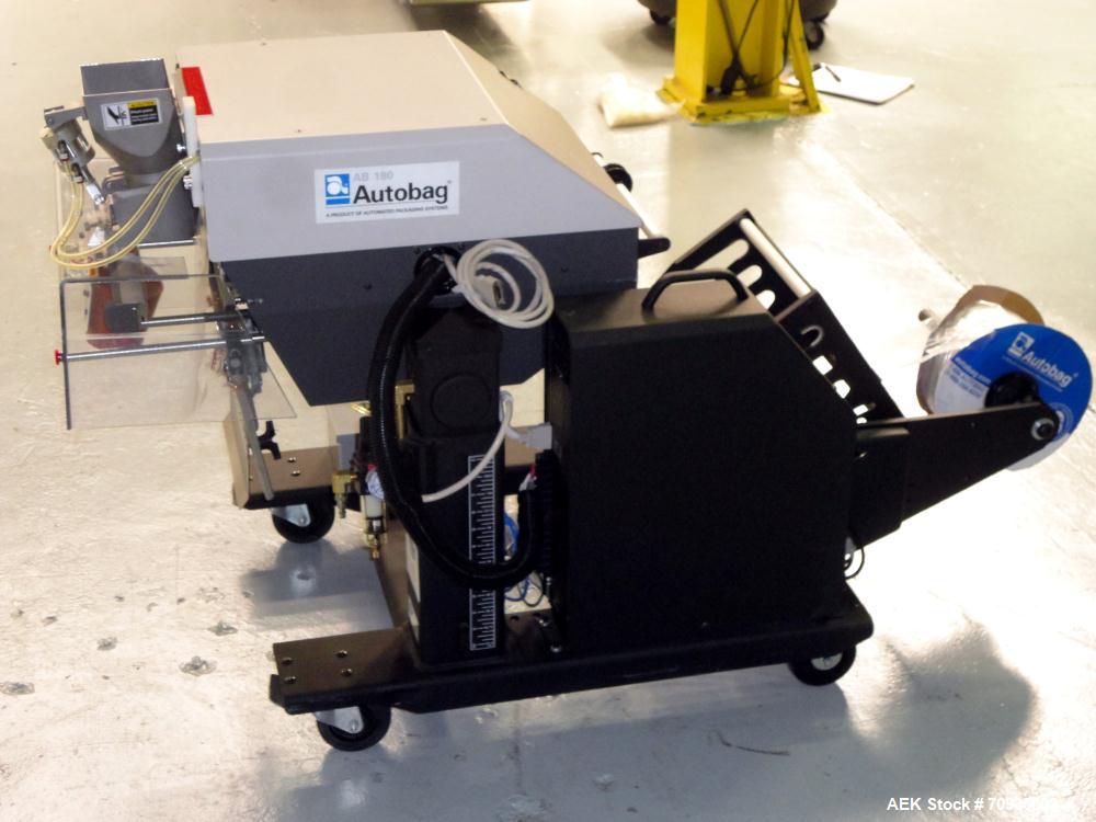 Used Automated Packaging Systems Autobag Model AB 180 Bagger. Capable of up to 80 bags per minute. Has bag size range of 2" to 11" Wide X 3" to 22" Long,  bag thickness of 1.0 to 4.0 mil, and Pass-th...