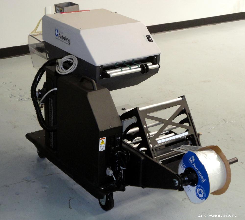Used Automated Packaging Systems Autobag Model AB 180 Bagger. Capable of up to 80 bags per minute. Has bag size range of 2" to 11" Wide X 3" to 22" Long,  bag thickness of 1.0 to 4.0 mil, and Pass-th...