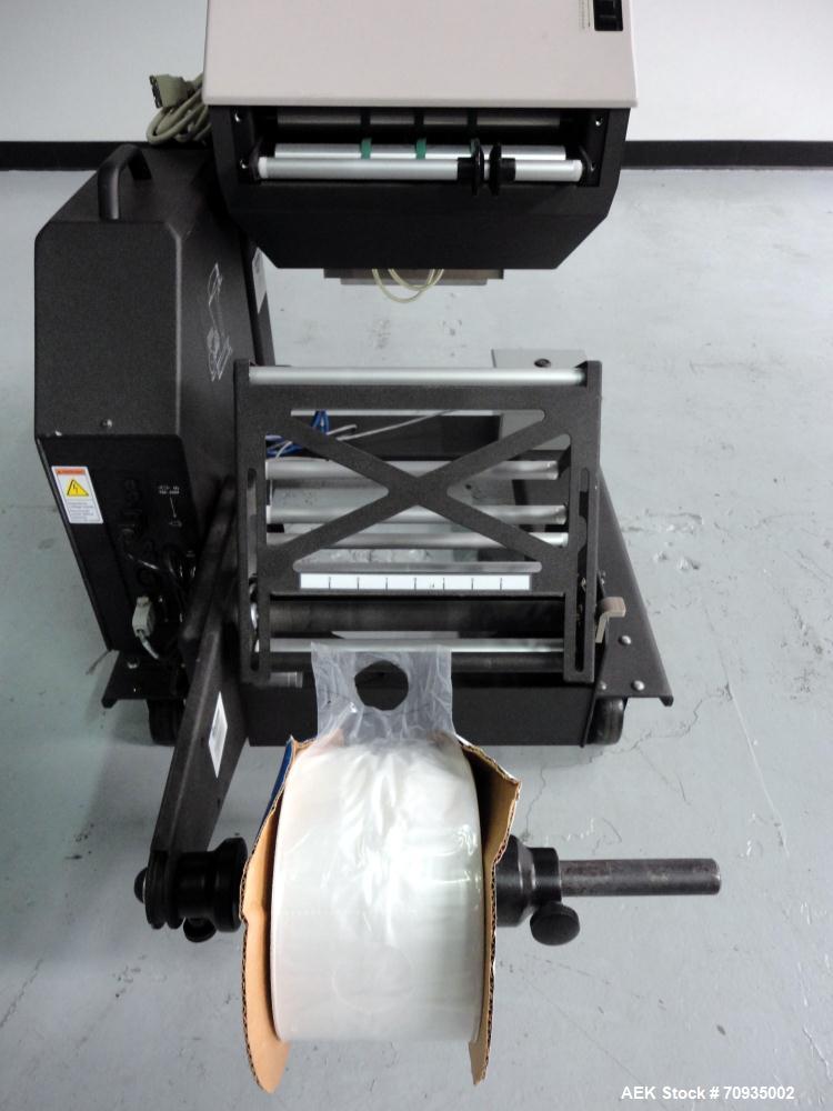 Used Automated Packaging Systems Autobag Model AB 180 Bagger. Capable of up to 80 bags per minute. Has bag size range of 2" to 11" Wide X 3" to 22" Long,  bag thickness of 1.0 to 4.0 mil, and Pass-th...
