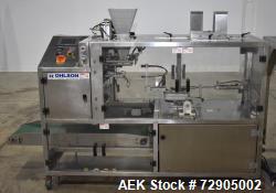 Used- Ohlson Premade Pouch Machine, Model HOFS-1013-JR. Capable of speeds up to 18 packs/min. Size range: 3.9" to 9.85" wide...