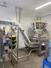 Used ActionPac APR360 Z/8 Rotary Pouch Packaging Machine with Scale & Elevator