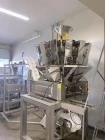 Used ActionPac APR360 Z/8 Rotary Pouch Packaging Machine with Scale & Elevator